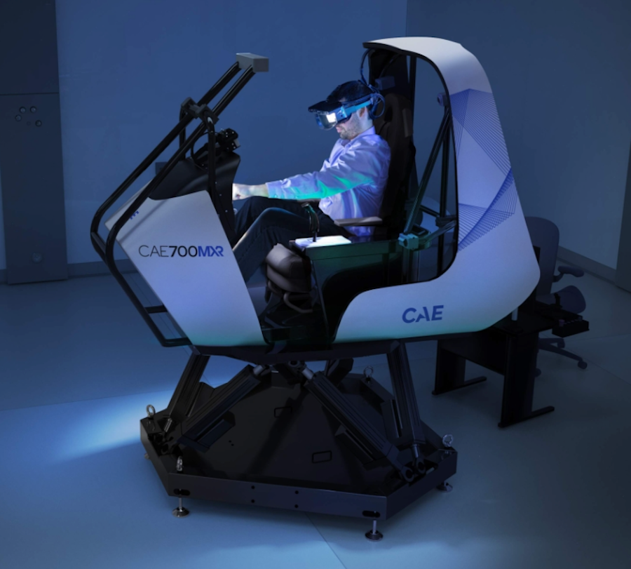 a person sitting inside an eVTOL simulator