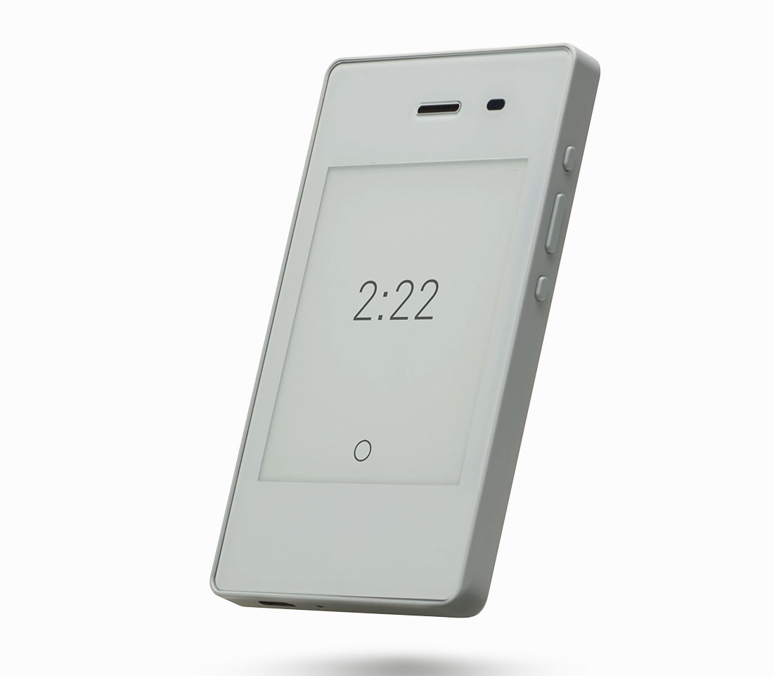 A minimalist dumpphone displaying the time 2:22 on its screen, shown against a plain white background