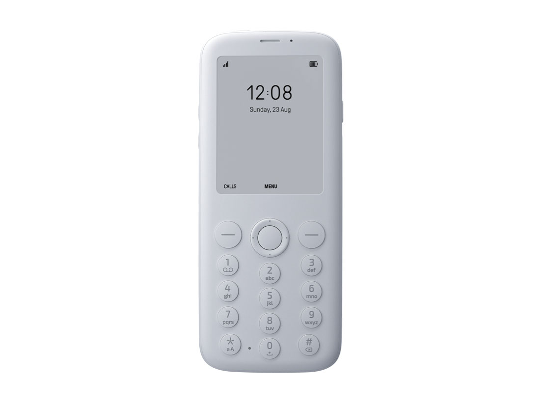 A white basic dumbphone with a small screen displaying the time and date, and a keypad featuring numerical buttons and a central navigation button.