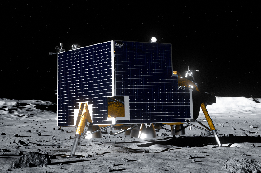 A lunar lander with a large, rectangular solar panel array rests on the rocky surface of the moon under a stark black sky.