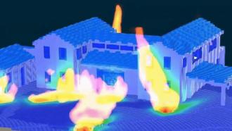 A thermal image of a blue house reveals flames displaying the intricate heat distribution, a crucial tool for assessing damage in wildfire-prone areas and evaluating insurance needs.